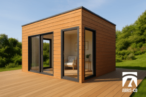 Abri de jardin haut de gamme en bois avec toit plat et grandes ouvertures dans un jardin contemporain